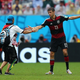 Illustration for article titled Soccer Bro Invades Pitch, High Fives Thomas Müller